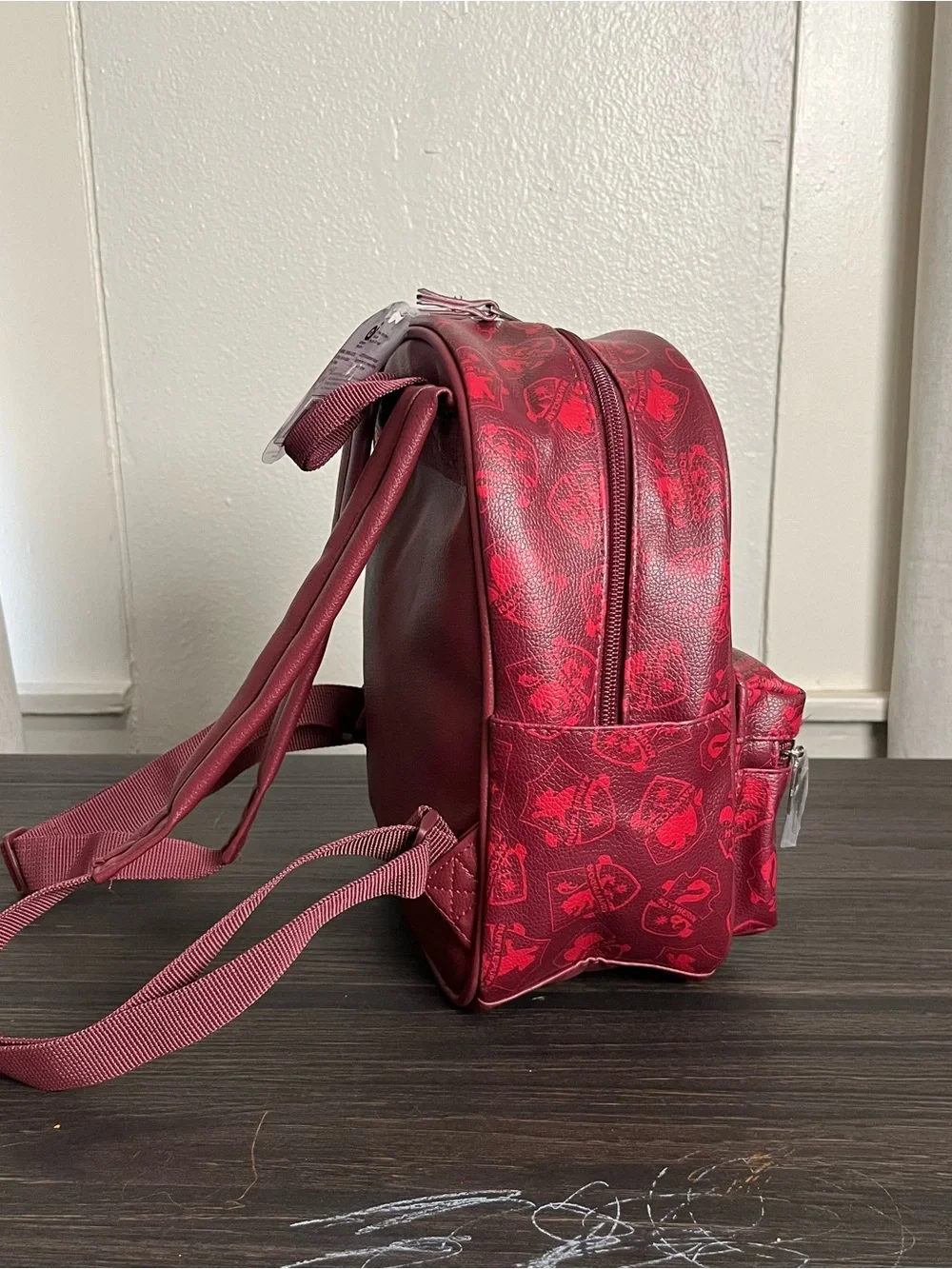 Maroon red faux leather Harry Potter Hogwarts mini backpack ft crest applique